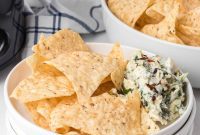 Warm & Cheesy Slow Cooker Spinach Artichoke Dip
