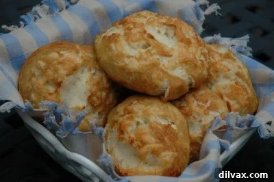 Thirty-Ninth Wicked Good Wednesday 6 Golden brown Asiago soft pretzel buns with a crispy crust and soft interior