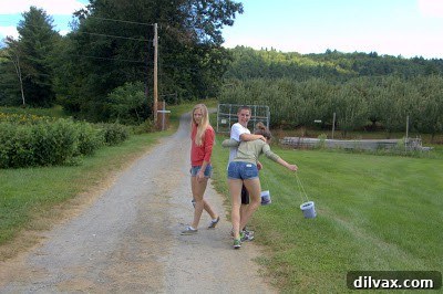 Children playing and having fun after picking blueberries