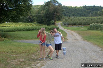 Brother playfully interacting with his sister on the farm
