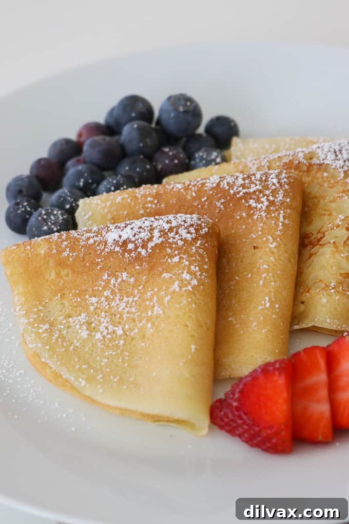 What are crepes? These are thin French crepes or pancakes made with flour, eggs, milk and a little sugar. This is an Easy Crepe Recipe!