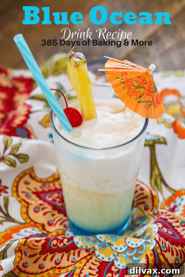 Azure Abyss Elixir 13 Detailed guide on how to make a Blue Ocean Drink recipe with a frozen Pina Colada and Blue Curacao layer