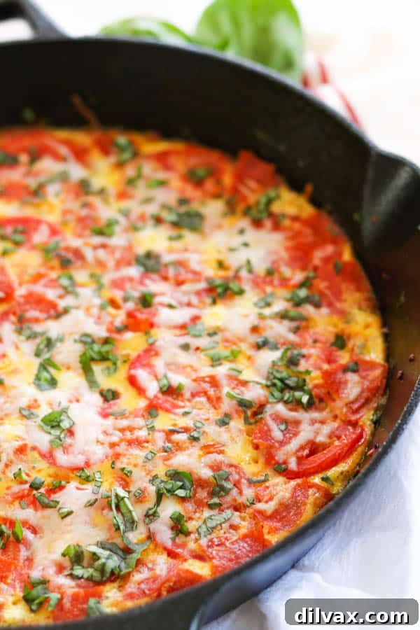 Half pan of Meat Lover's Pizza Frittata. Half pan of Meat Lover's Pizza Frittata, sliced.