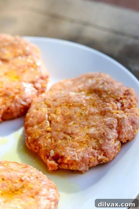 Cheesy Spiced Pork Burgers patties formed and ready for the grill!