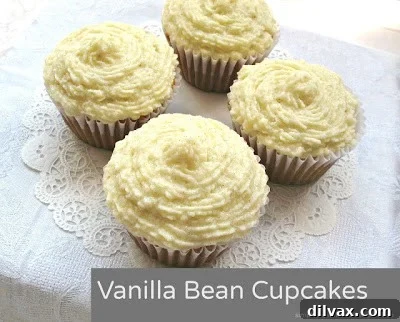 Delicate vanilla bean cupcakes with creamy frosting