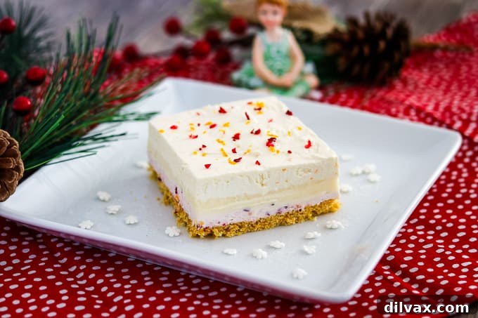 Cranberry Orange Dream Bars on a plate, ready to be enjoyed as a festive holiday dessert.
