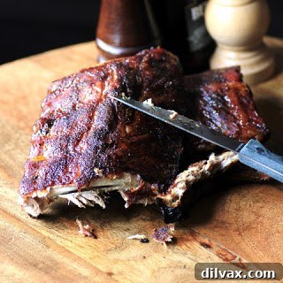 Perfectly cooked Dry Rubbed Smoked Back Ribs