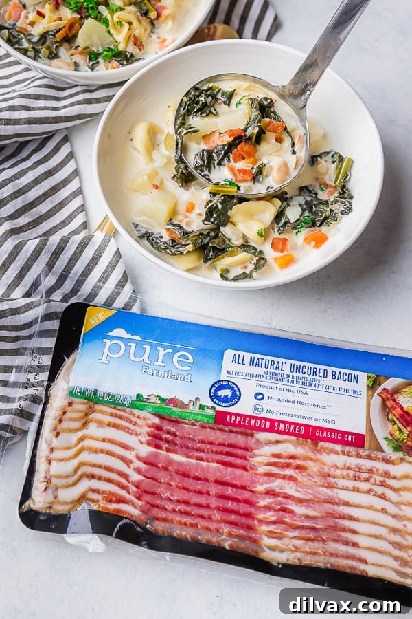 Pure Farmland Bacon and a bowl of One Pot Bacon and Tortellini Zuppa Toscana. A bowl of One Pot Bacon and Tortellini Zuppa Toscana next to a package of Pure Farmland Bacon.