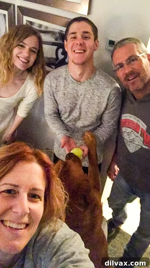 Furry Friday: Pawsitively Pining 8 Lynne Feifer of 365 Days of Baking embracing her family, including Logan the Golden Dog, during their cross-country move and reunion.