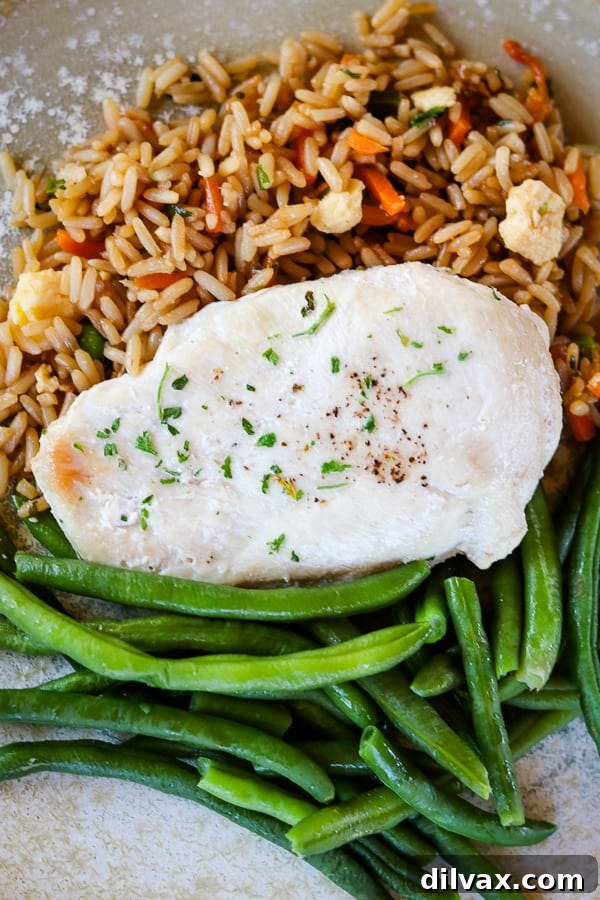 A balanced meal with Schwan's Vegetable Fried Rice, Chicken Breast Fillet and MicroSteam Whole Green Beans.