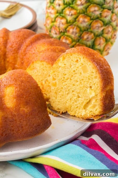 Caribbean Pineapple Rum Indulgence 12 A close-up of the perfectly baked pineapple rum bundt cake, showcasing its rich golden color.