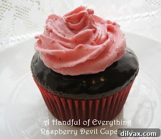 Midweek Magic 3 Raspberry Devil Cupcakes with frosting and fresh raspberries