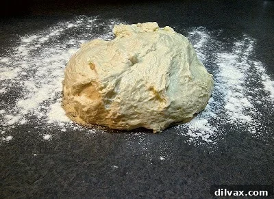 Freshly made Rhode Island Pizza Dough, rolled out and ready for toppings.