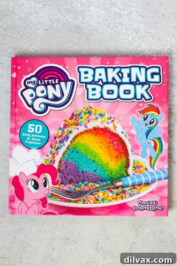 A colorful copy of the My Little Pony Baking Book by Christi Johnstone, open to a recipe page.