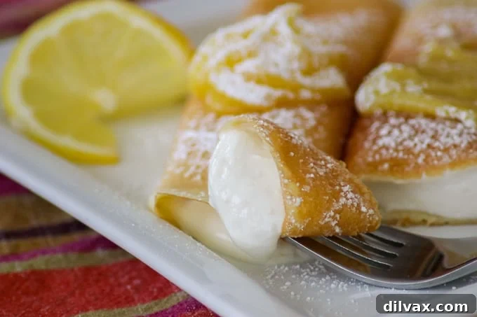 Delicate Lemon Crepes filled with a zesty lemon flavor in every bite, perfect for a light and elegant breakfast or dessert.