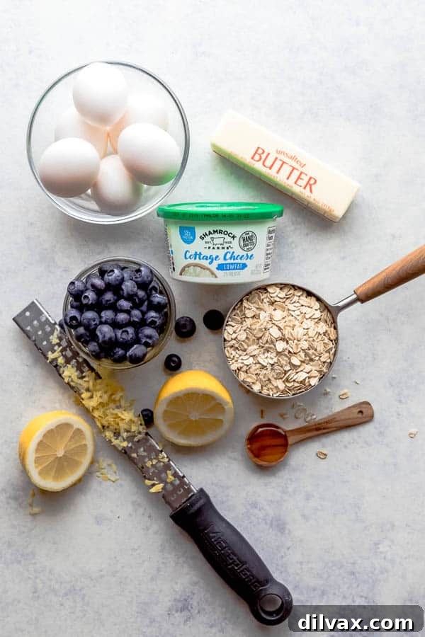 Ingredients for Healthy Cottage Cheese Pancakes All the fresh ingredients laid out for Lemon Blueberry Cottage Cheese Pancakes: Shamrock Farms cottage cheese, eggs, oats, lemons, blueberries, honey, and butter.