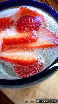 Refreshing Strawberry Cream Soda with fresh strawberries