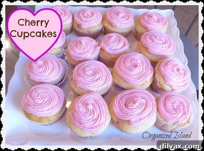 Delicious Cherry Cupcakes topped with frosting and a cherry