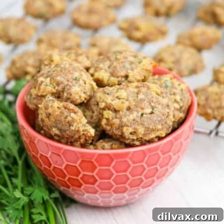 Cheesy Chicken Bites for Happy Pups 4 A bowl of Chicken and Cheese Dog Treats next to a cooling rack, ready for your dog.