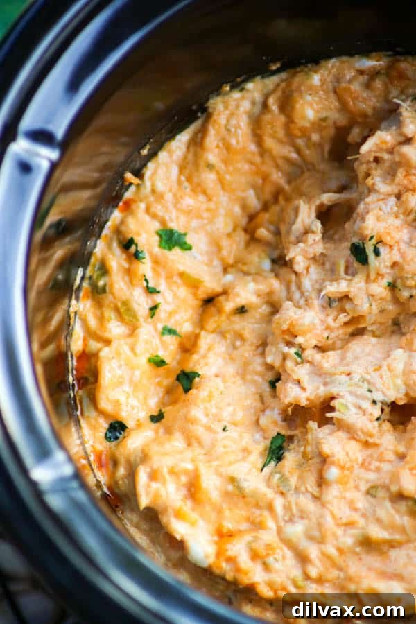 Slow Cooker Buffalo Chicken Dip served in a small bowl.