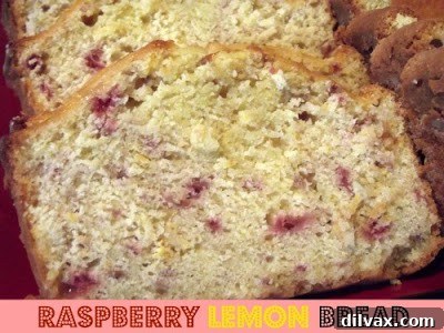 Delicious slice of Raspberry Lemon Bread with fresh berries