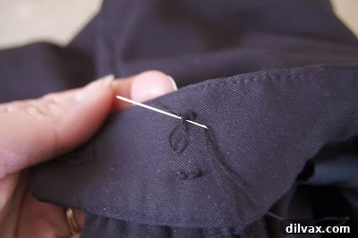 Step 7: A loop formed by the tail of the thread.