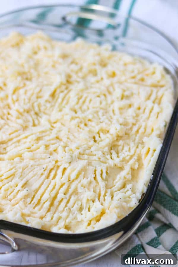 Mashed potatoes on top of this Easy Shepherd's Pie Recipe. Mashed potatoes on top of this Easy Shepherd's Pie Recipe.
