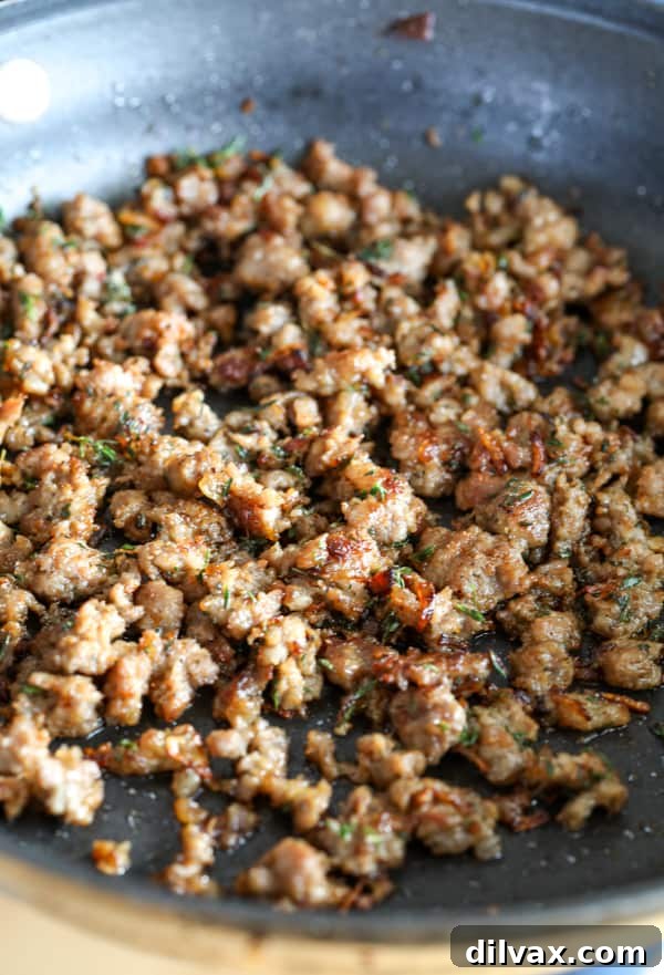 Sausage for Cheesy Sausage Stuffed Mushrooms. Cooked pork sausage for Cheesy Sausage Stuffed Mushrooms.