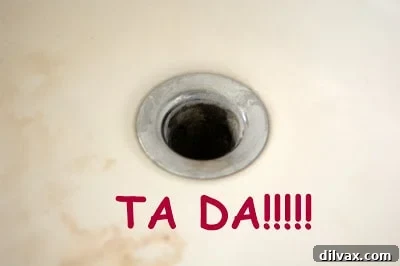 Pouring boiling water down a clean sink drain