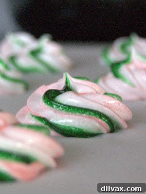 Ingredients laid out for peppermint meringues before mixing, including egg whites and sugar.