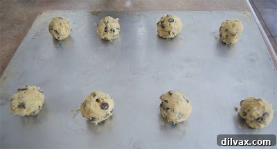 Large balls of cookie dough ready for baking.