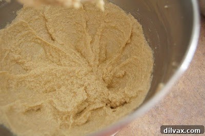 Close up of pumpkin spice white chocolate cookie dough before baking.