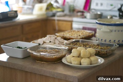 A beautifully set Thanksgiving table, hinting at the feast to come.