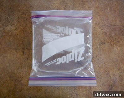 The double-bagged flexible ice pack before freezing, showing the inner bag securely placed within the outer bag.
