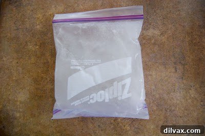 A fully frozen but flexible DIY ice pack, still soft and moldable, taken directly from the freezer.