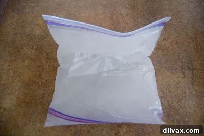 Flexible ice pack being bent to show pliability