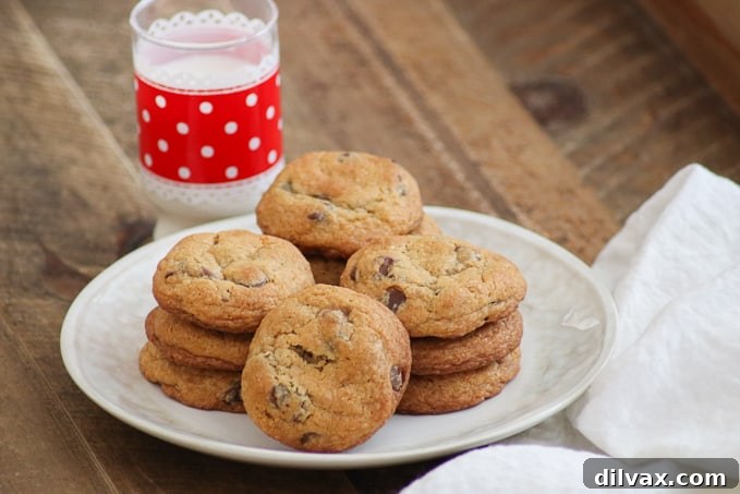 Decadent Chocolate Caramel Toffee Cookies 7 There's nothing quite like that feeling when you bite into Soft and Chewy Chocolate Chip Cookies. Two secret ingredients add flavor and texture, and whether they remind you of Grandma's kitchen or your favorite bakery, these cookies will immediately have you pouring a glass of milk to dunk them in.