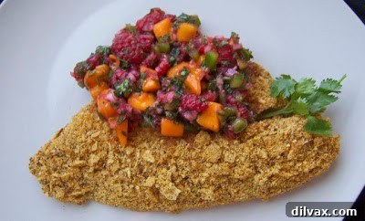 Raspberries and Mango for Salsa Fresh raspberries and mango cubes, key ingredients for the homemade fruit salsa.