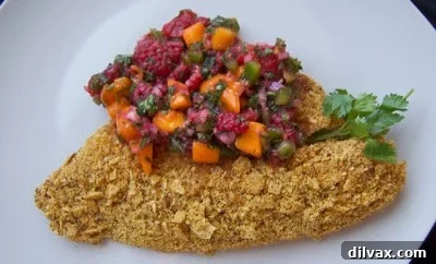 Seared Tilapia Tacos with Vibrant Raspberry Mango Salsa 8 Close-up of the fresh raspberry mango salsa.