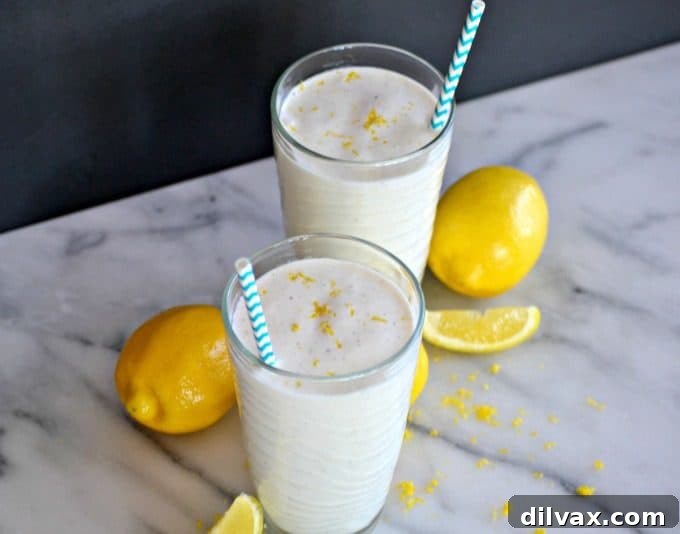 This Frosted Lemonade is a blend of lemonade and vanilla ice cream. It's an ice cold treat like Chick-fil-A's that is perfect for a hot summer's day!