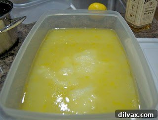 Another view of the delicious homemade frozen lemonade in a clear glass.