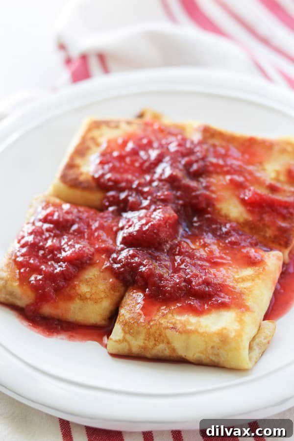 Unlock the Secrets to Perfect Cheese Blintzes 14 The ultimate cheese blintzes recipe topped with an easy 3-ingredient strawberry sauce.