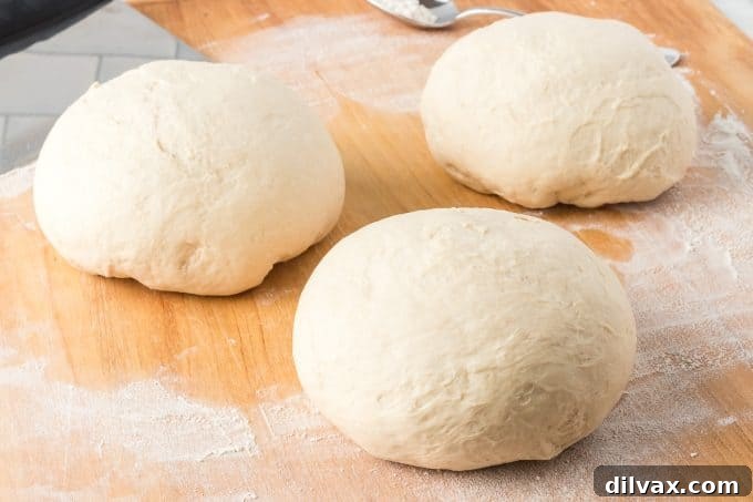 Pizzeria-Quality Pizza Dough At Home 2 Homemade Pizza Dough - THREE medium pizzas from one recipe. Freshly made pizza dough portions ready for baking.