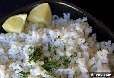 Zesty Cilantro Lime Rice 4 Lime being squeezed over freshly chopped cilantro