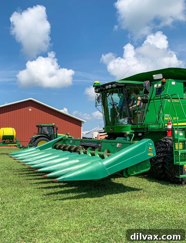 A combine. A modern combine harvester at work in a field, symbolizing efficient farming.