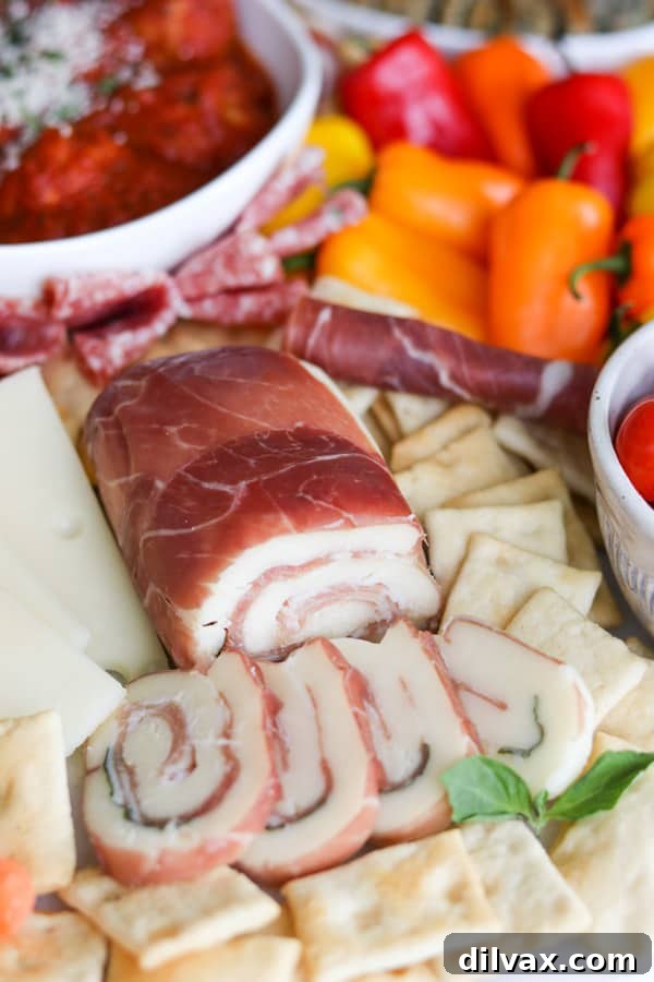 The Art of Building a Charcuterie Board 7 Primo Taglio® Cheese Mozzarella Prosciutto Roll for a Meat and Cheese Board / Charcuterie.
