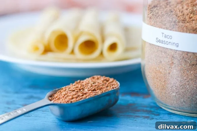 DIY Taco Spice Blend 2 Taco Seasoning - a vibrant blend of spices ready for use in a small bowl.