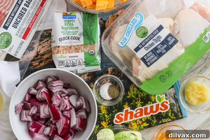 Savory Herb-Roasted Chicken and Vibrant Vegetables 2 Dinner ingredients ready for cooking on a sheet pan.