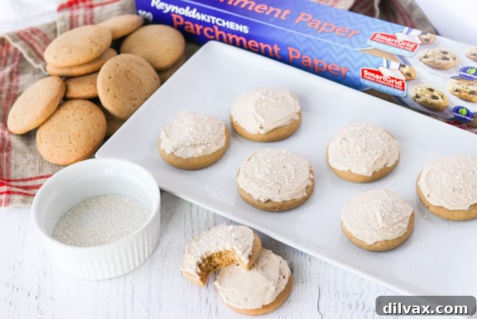 Root Beer Float Cookies on a plate Frosted and unfrosted Root Beer Float Cookies arranged beautifully.