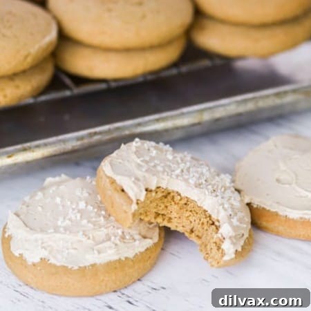 A bite taken out of a Root Beer Float Cookie, showing its soft texture.